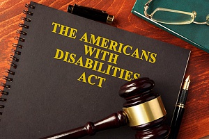 a book about the Americans with Disabilities Act along with a gavel owned by an ADA lawyer