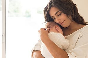 a new mother who is receiving FMLA leave to spend time with her newborn