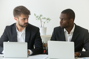 two men seeing discrimination in the workplace