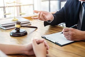 Employment discrimination attorney with client 