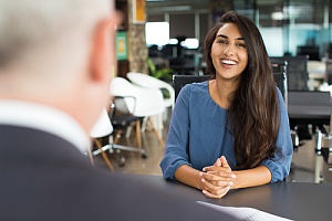 man interviewing woman for employment
