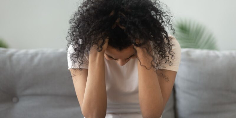 Woman feeling anxious after her civil right are violated