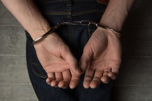 A handcuffed man after an arrest